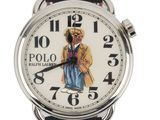 a close up of a watch with a bear on it