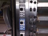 an image of a machine that has a bunch of buttons on it