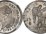 a silver coin with an image of a woman holding a flag