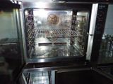 an open oven that has a lot of food inside of it