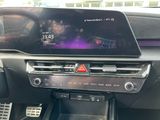 the dashboard of a car with a digital display in the center