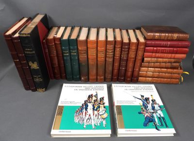 several books are stacked on top of each other on a table