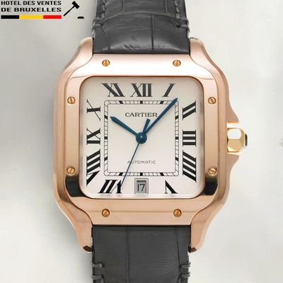 an image of a close up of a wrist watch with roman numerals