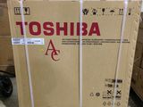 a box of toshiba is sitting on a pallet in a warehouse