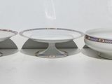three bowls sitting on top of each other on a table