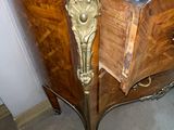 a marble top table with a marble top on it