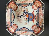 a plate with a design on it on a table
