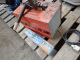 a box that has some tools on it on a pallet