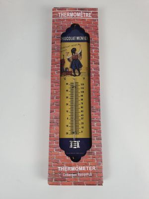 a close up of a thermometer on a brick wall
