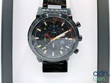a watch that is in a box on the table