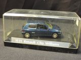 a blue toy car in a clear case