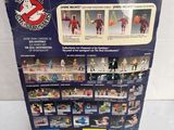 the back of a package of action figures of the ghostbusters