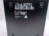 the back of a laptop with a black back panel and a white back panel