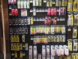 a large display of different types of tools in a store