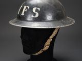 a silver helmet with the letters f s on it