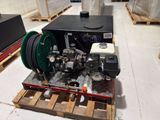 a picture of a water pump on a pallet in a warehouse