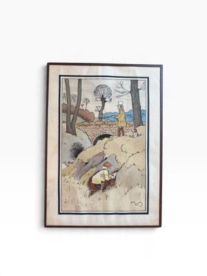 framed picture of a painting of a man and a woman on a beach