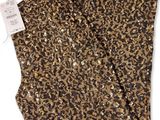un pantalon à imprimé léopard avec des paillettes dorées
