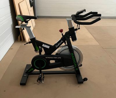 a bike that is sitting on a stand in a garage