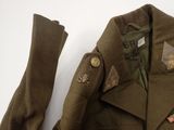 a close up of a military uniform jacket with buttons on it