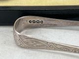 a spoon that has some sort of writing on it