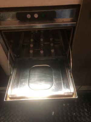 un four ouvert contenant une plaque métallique