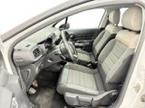the interior of a car with the front seats folded down