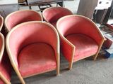 four chairs that are sitting in a room together