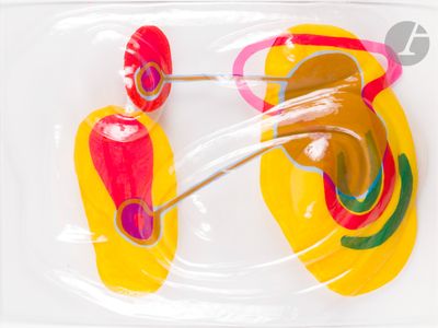 a pair of yellow and red ear plugs in a plastic bag