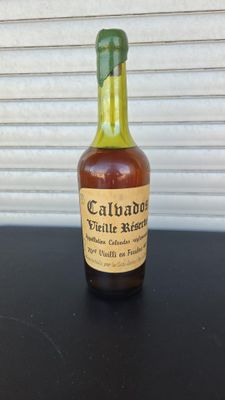 an image of a bottle of wine sitting on a table