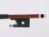a close up of a violin bow on a white background