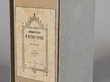 packaging for a book with a picture of a castle on it