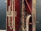 an image of a silver trumpet and a silver trumpet in a case