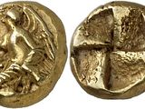 a gold coin with an image of a woman holding a cross
