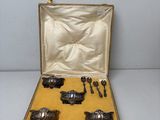 silverware in a case with spoons and spoons in it