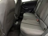 the back seats of a car with a seat belt in the back