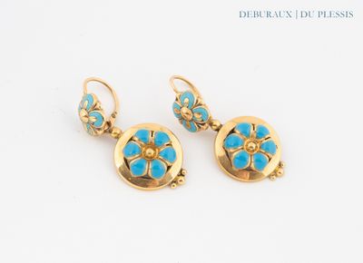 pair of turquoise and gold earrings