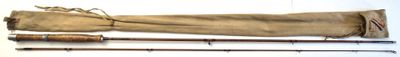 three different types of fishing rods on a white surface