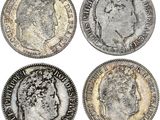 quatre types différents de pièces d'argent, dont l'une représente un buste et l'autre un buste