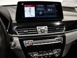the dashboard of a car with a digital display in the center