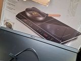 a box on top of a computer with a mouse on it