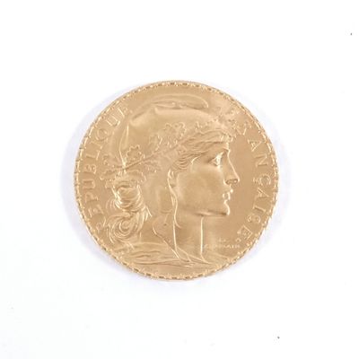 an image of a gold coin with a woman ' s face on it