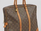 Porte-documents Louis Vuitton en toile Monogram et cuir