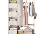 a close up of a rack with clothes and shoes on it