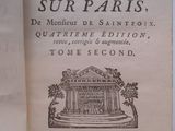 an old book with a picture of a building on it