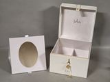 a white box with a picture of a woman inside of it