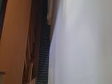 a picture of a room with a door and a window