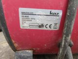 an image of a close up of a red machine