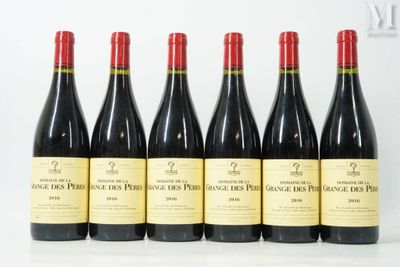 six bottles of red wine are lined up on a white surface