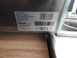 a picture of a dishwasher with a bar code on it